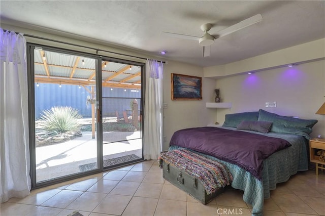 bedroom featuring access to exterior, light tile patterned floors, and ceiling fan