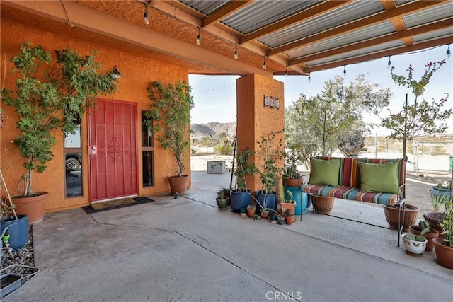 view of patio with a mountain view