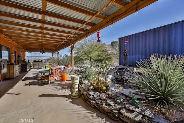 view of patio / terrace featuring exterior kitchen