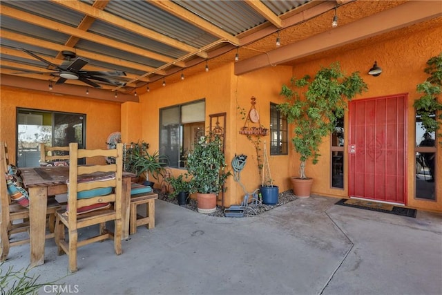 view of patio / terrace featuring ceiling fan