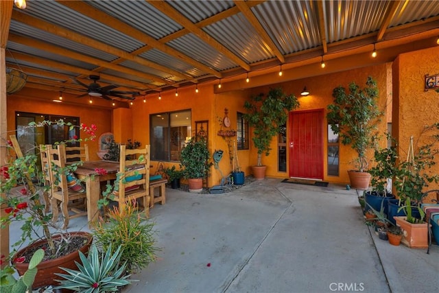 view of patio with ceiling fan