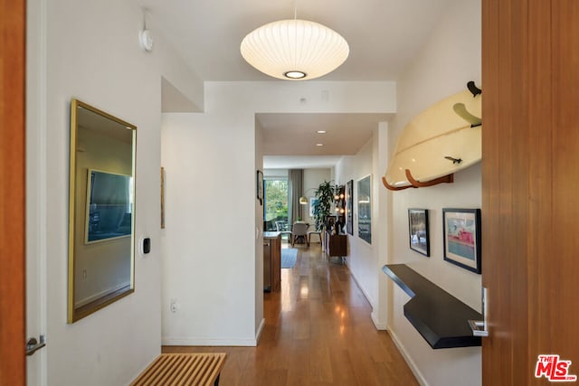 hallway featuring hardwood / wood-style floors