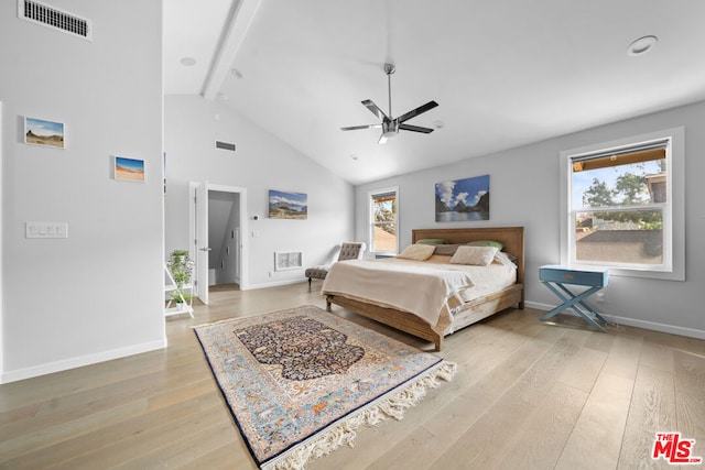 bedroom with beamed ceiling, ceiling fan, high vaulted ceiling, and light hardwood / wood-style flooring