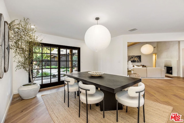 dining area with light wood-type flooring