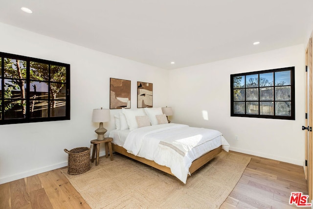 bedroom featuring hardwood / wood-style flooring