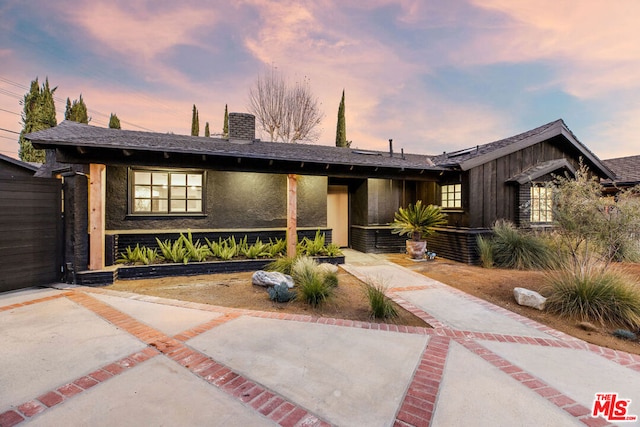 view of front of house featuring a patio area