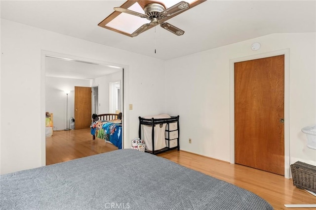 bedroom featuring ceiling fan and wood-type flooring