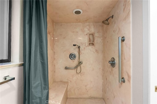 bathroom with curtained shower