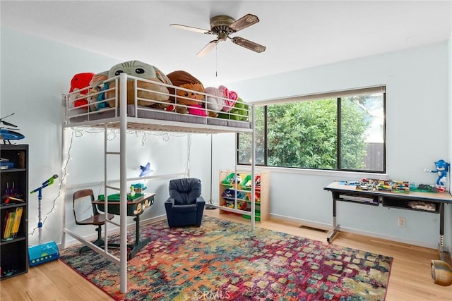 bedroom featuring wood-type flooring