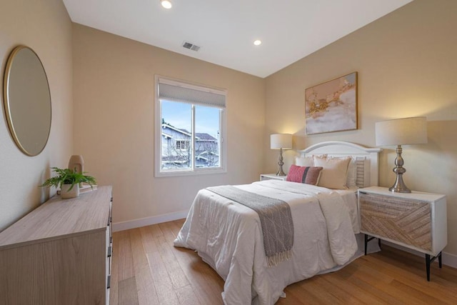 bedroom featuring light hardwood / wood-style flooring