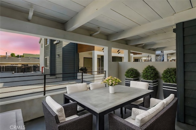 view of patio terrace at dusk