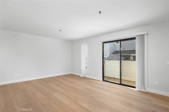 empty room featuring light wood-type flooring