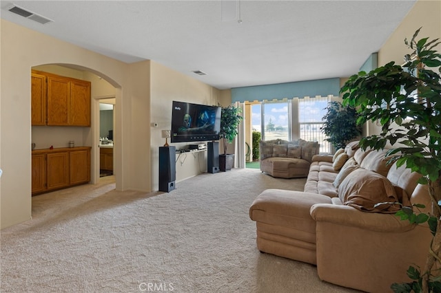 living room featuring light colored carpet