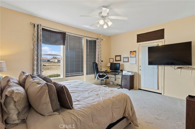 bedroom with light colored carpet and ceiling fan