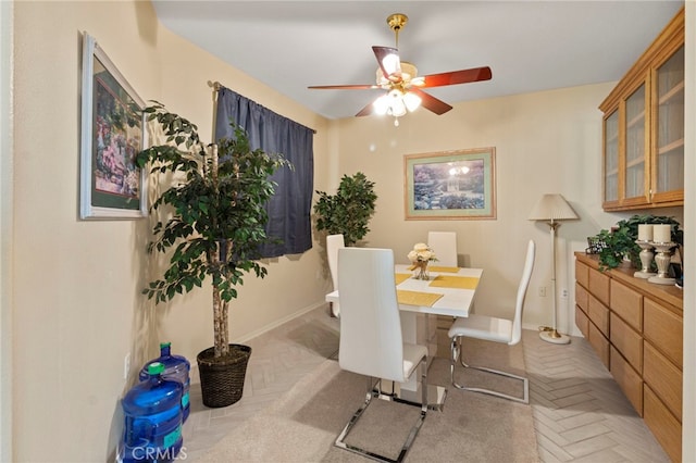 dining room featuring ceiling fan