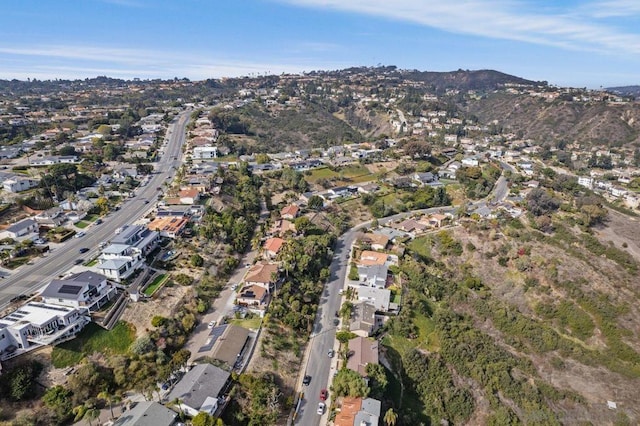 birds eye view of property featuring a mountain view