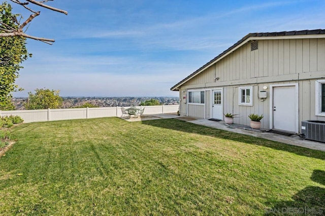 view of yard with central AC unit