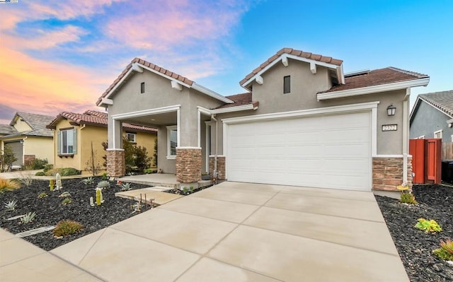 view of front of property featuring a garage