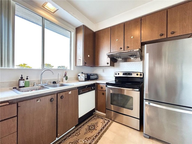 kitchen with sink and appliances with stainless steel finishes