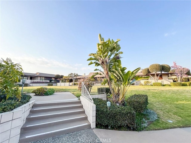 view of community featuring a lawn