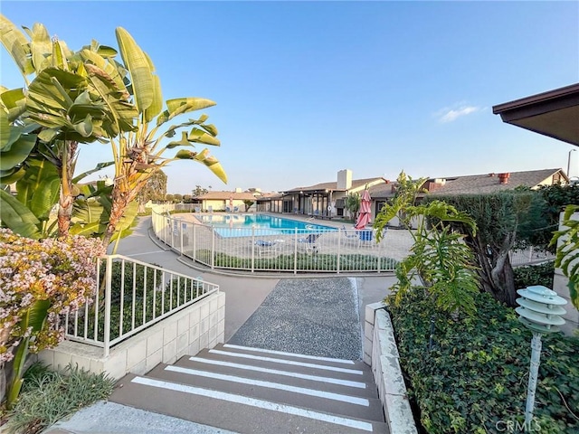 view of pool featuring a patio area