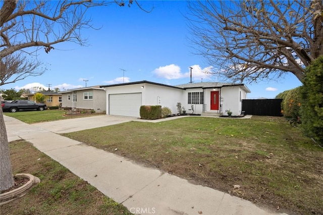 single story home with driveway, an attached garage, fence, a front lawn, and stucco siding