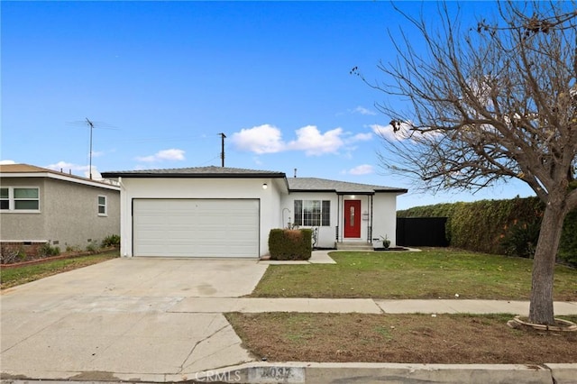 ranch-style house with concrete driveway, a front lawn, an attached garage, and stucco siding