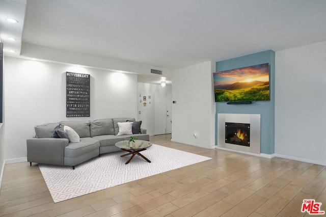 living room featuring light wood-type flooring