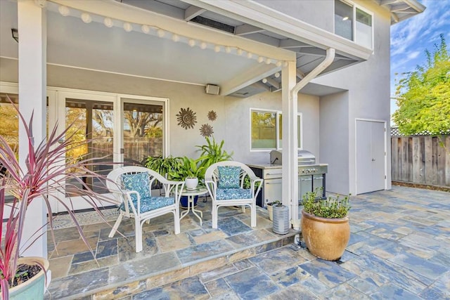 view of patio / terrace with a grill