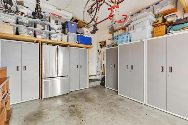 garage featuring stainless steel refrigerator