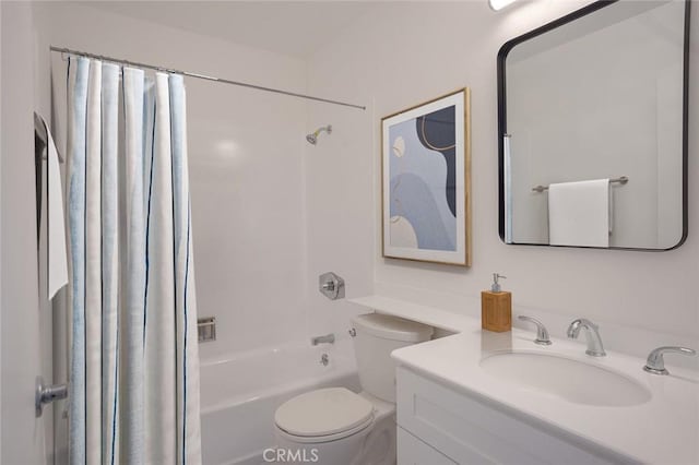 bathroom featuring toilet, shower / tub combo, and vanity