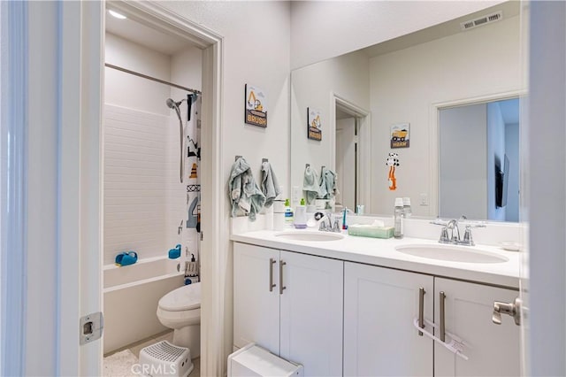 full bathroom with shower / bathtub combination with curtain, vanity, and toilet