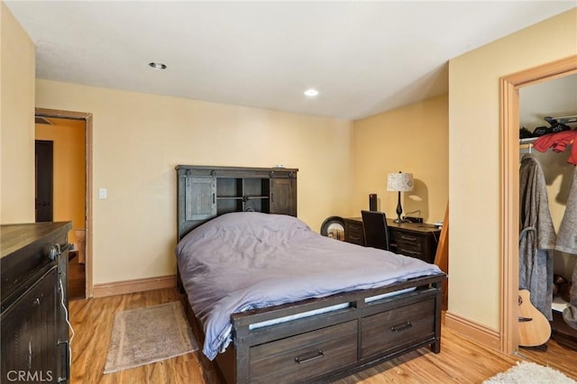 bedroom featuring light wood-type flooring