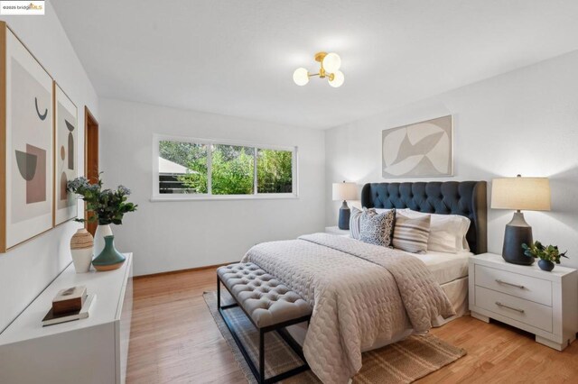 bedroom with light hardwood / wood-style flooring