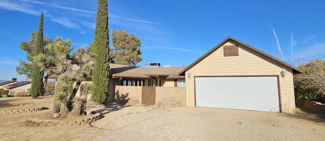 view of front of home featuring a garage