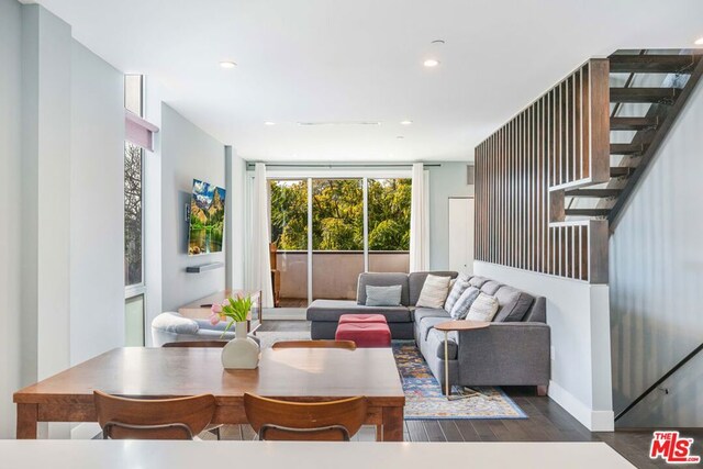 living room featuring dark hardwood / wood-style floors