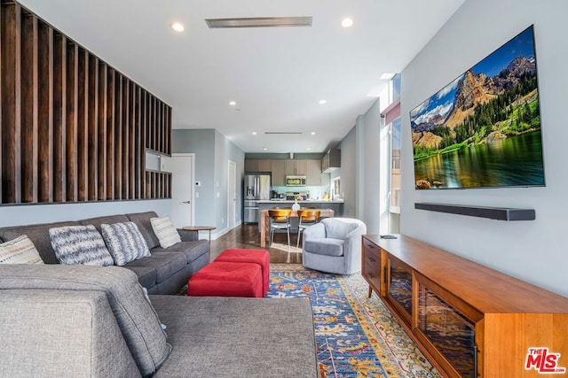 living room with hardwood / wood-style floors