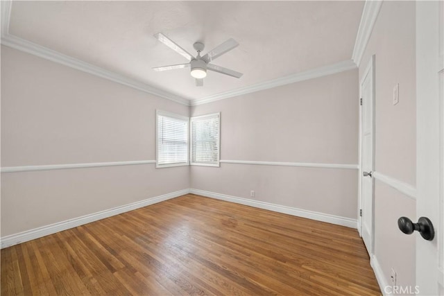 unfurnished room with hardwood / wood-style flooring, crown molding, and ceiling fan