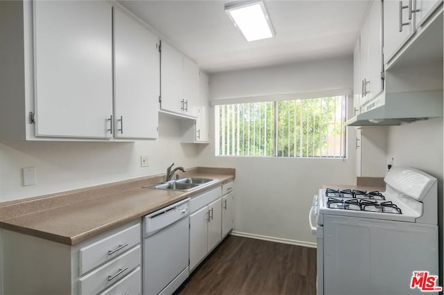 kitchen with sink, dark wood-type flooring, white cabinets, and white appliances