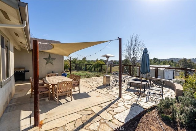 view of patio with a grill