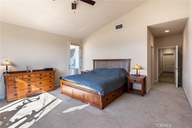 bedroom with high vaulted ceiling, light colored carpet, and ceiling fan