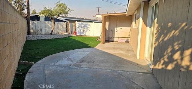 view of yard with a patio area