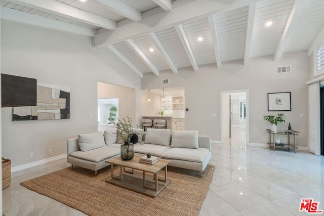 living room featuring beam ceiling, wood ceiling, and high vaulted ceiling