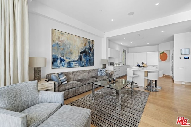 living room featuring light wood-type flooring