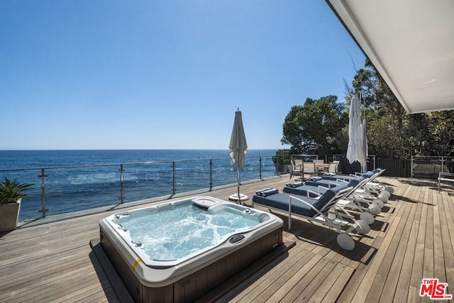 wooden terrace with a water view