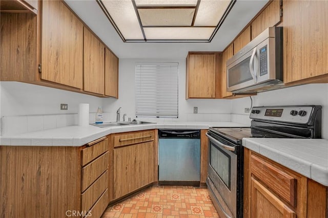 kitchen with stainless steel appliances and sink