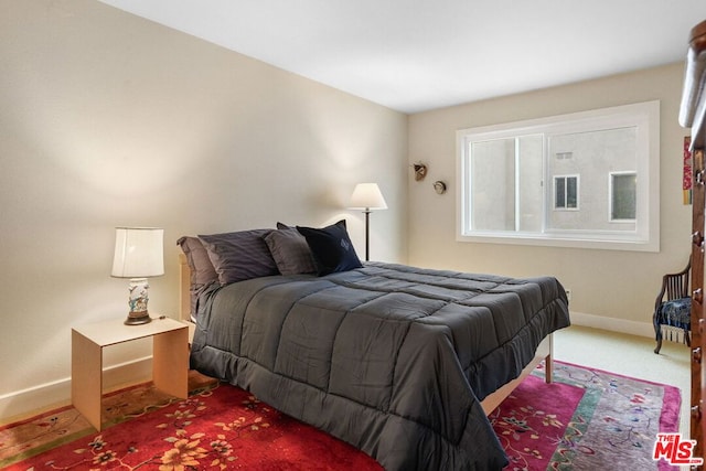 bedroom featuring carpet flooring