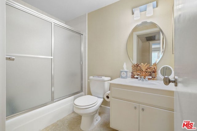 full bathroom with vanity, toilet, and combined bath / shower with glass door