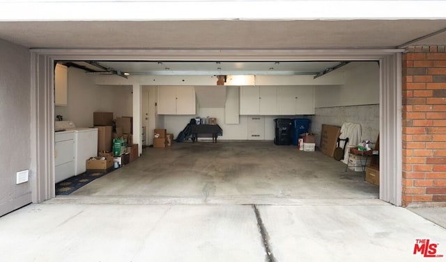 garage with separate washer and dryer