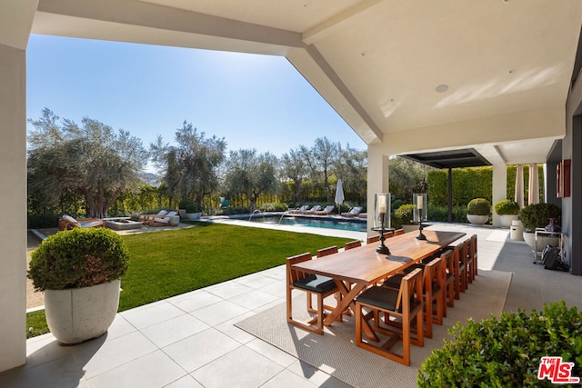 view of patio with pool water feature